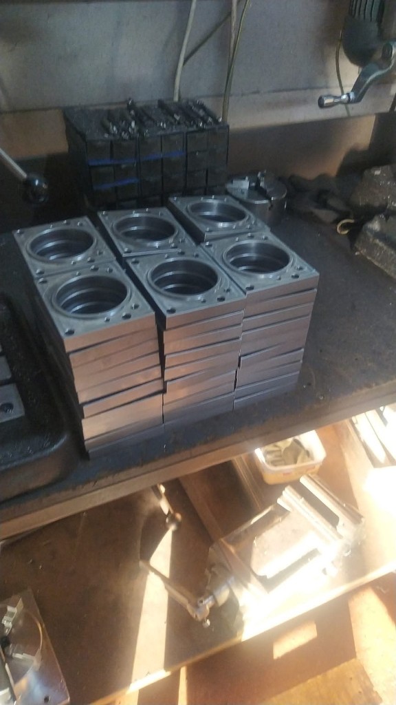 Shrink-wrapped large steel flanges with bolt holes