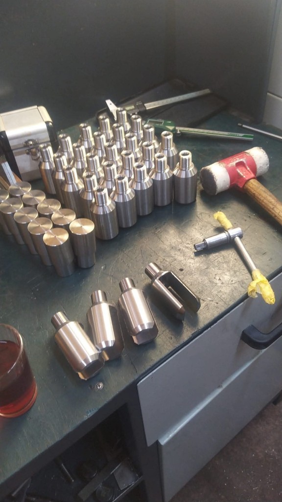 Machined steel blocks with cylindrical bores